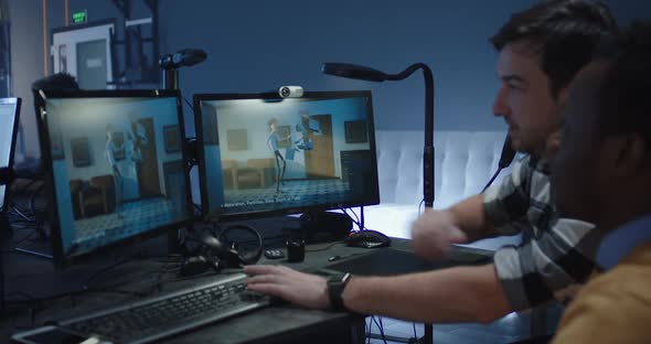 Digital Artists Discussing an Animated Film alt