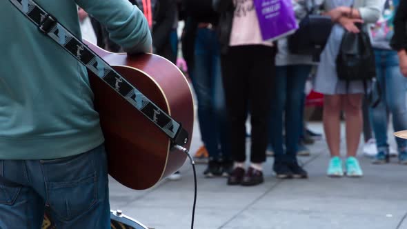 Musician Gives Art To Passersby