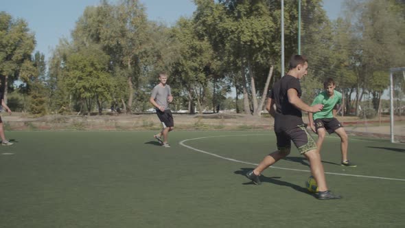 Soccer Ball Hitting Goalpost After Kick During Game alt