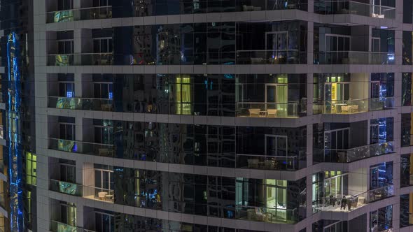 Scenic Glowing Windows of Skyscrapers at Evening Timelapse alt