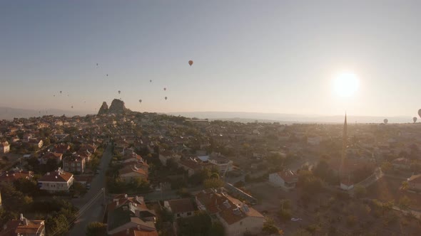 Cappadocia Aerial Shot of Rock Chimneys and Uchisar Castle in Goreme Turkey alt