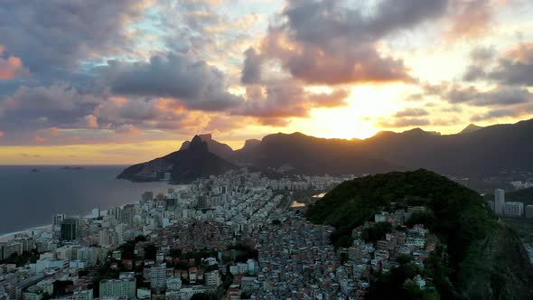 Sunset at landmark Gavea mountain peak at Rio de Janeiro, Brazil. alt