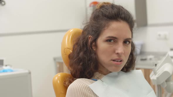 Portrait of Female Patient with Toothache alt