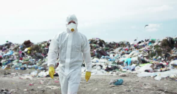 Virologist Comes to Camera and Shows Nosign with Crossed Hands and Nods Head alt