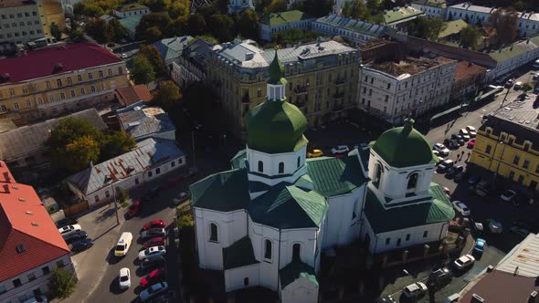 Aerial view of Church of St. Nikolay Pritisk and historical part of Kyiv - Podil alt
