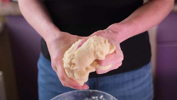 Apple Pie Preparation Series  Women's Hands Kneading Dough alt