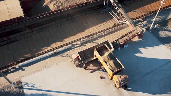 Loading and unloading at seaport. Grain elevator loading silage. Loading cargo ship alt