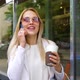 Smiling Blonde Married Woman in Sunglasses Talking on Mobile Phone on City Street - VideoHive Item for Sale