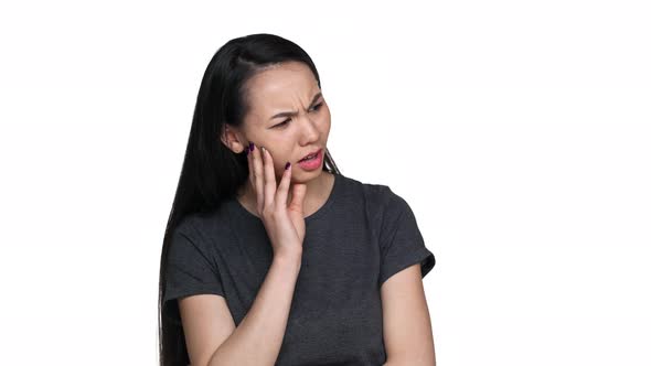 Portrait of Displeased Asian Woman with Long Dark Hair Having Oral Problem and Suffering From alt
