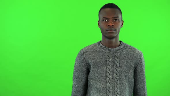 A Young Black Man Protests at the Camera - Green Screen Studio alt