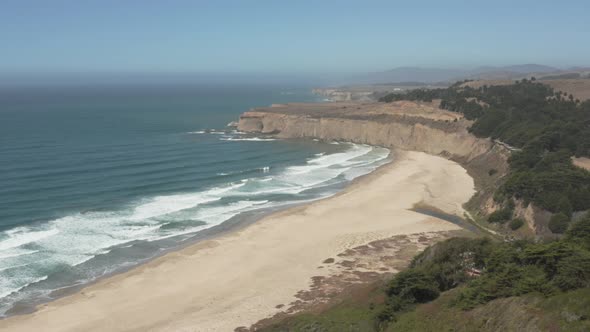 Aerial of pacific Coast Highway near Half Moon Bay on California Coast alt