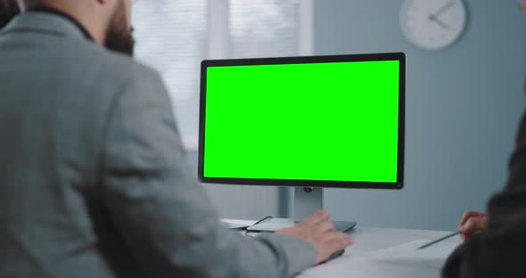 Partners Using Green Monitor of Pc