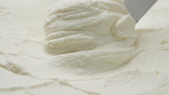 Cream cheese with knife, extreme close up, 4k ProRes uncompressed