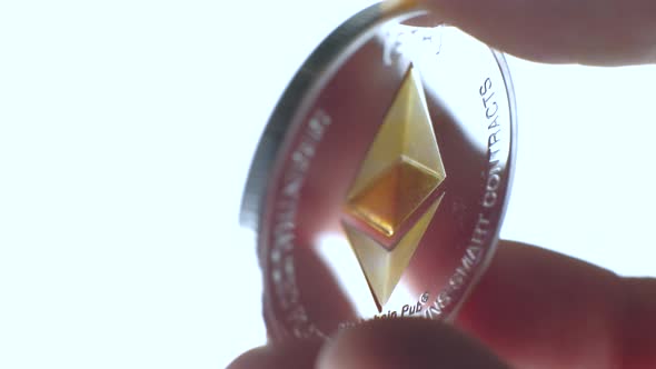 Ethereum Coin in the Man's Hand alt