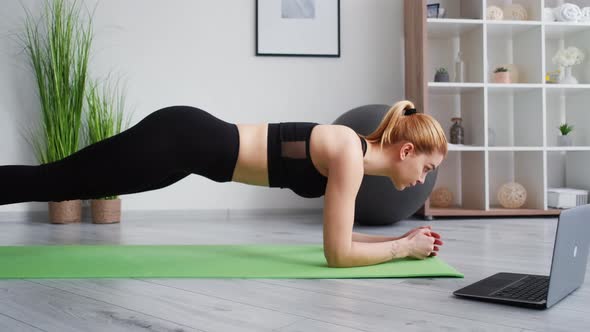 Fitness at Home Pilates Online Woman Holding Plank alt