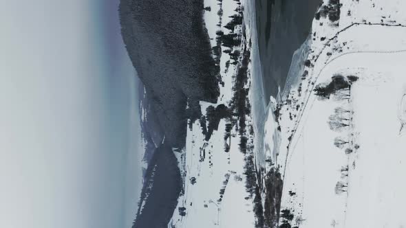 Frumoasa Dam During Winter In Romania - Vertical Video for Social Media Stories alt