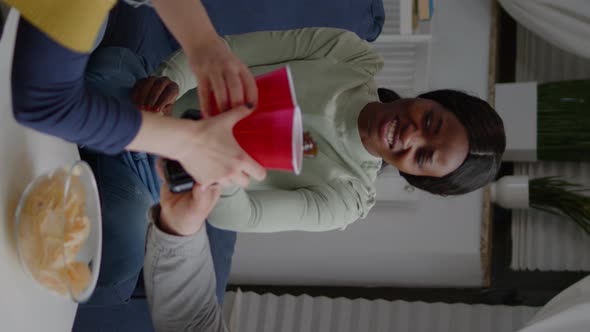 Vertical Video Multicultural Friends Cheering Bottles of Beer Spending Time Together alt