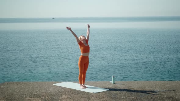 Yoga Woman Near the Sea