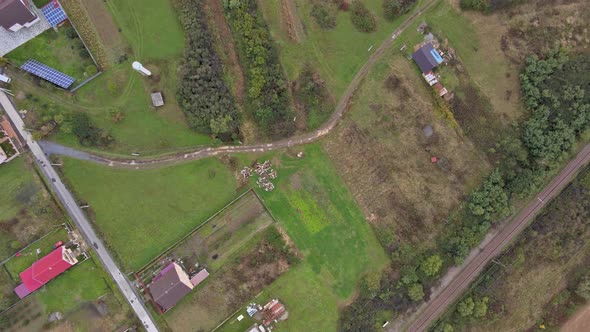 Village with Red Roofs of a House Beautiful of European Fields Aerial Top View of Land with Down alt