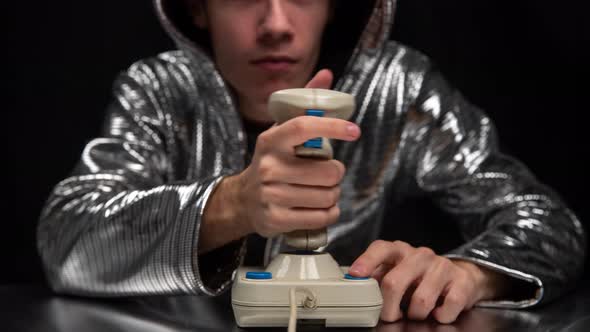 Young Man Playing Video Game alt