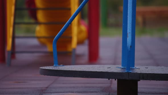 Empty wet playground in the park alt