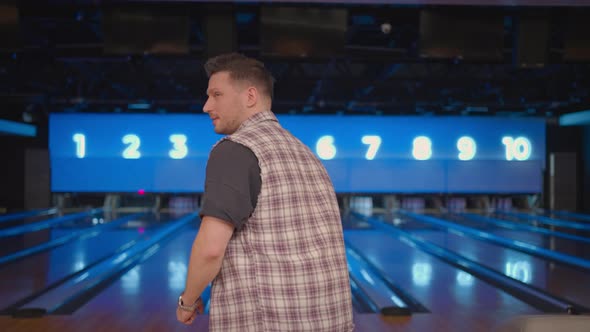 Caucasian Man Jumps Joyfully Looking Into the Camera Celebrate the Victory in Slow Motion alt