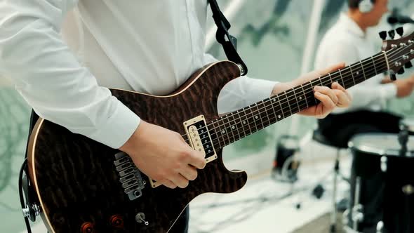 Musician Playing Electric Guitar Closeup On Hands Playing On Electric Guitar By Megahawk Ru