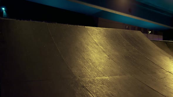 Extreme Man Riding Bmx Bike at Night in Urban Skatepark alt