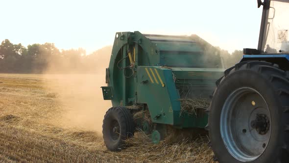 Farmer Harvesting Straw. alt