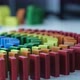 Line up of Dominoes in Rainbow Falling Colors with LGBT Colors of a Hand - VideoHive Item for Sale