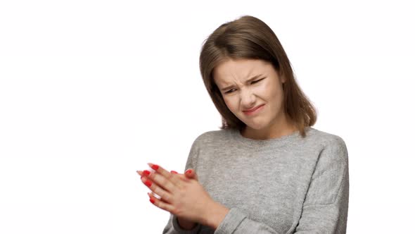 Portrait of Discontented Female in Casual Clothes Feeling Aversion Looking with Displeased alt