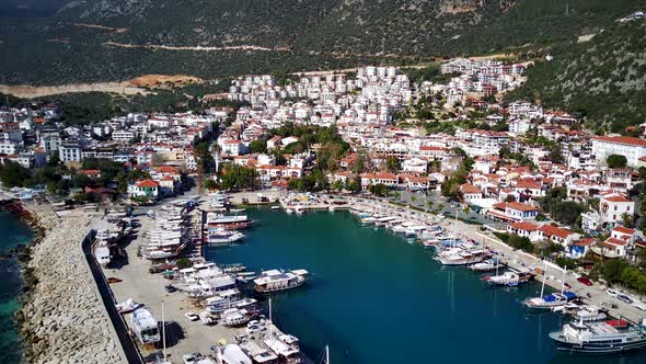 The top view from the drone of Kas resorts, bay, yahts, city in Mugla in Turkey alt