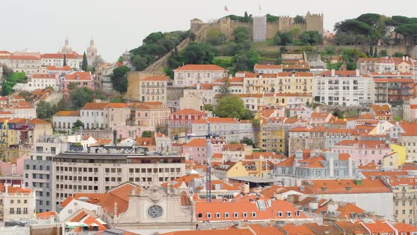 Lisbon Portugal Cityscape with Historic Sao Jorge Castle and Old Town at Sunset alt