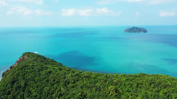 Aerial abstract of tranquil lagoon beach time by shallow ocean with white sand background of a dayou alt