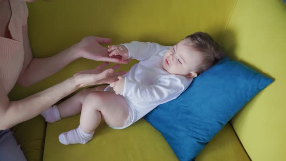 Close Up of Mom With Little Baby At Home alt