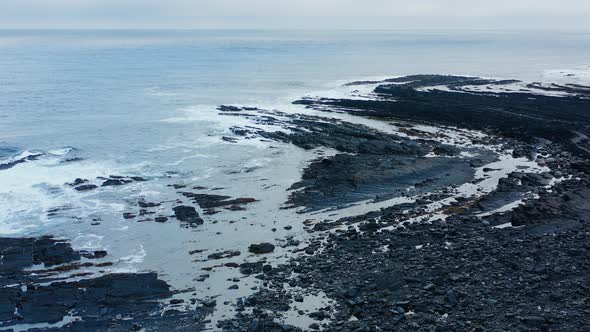 Aerial top view: Fantastic rocky coastal winter landscape.