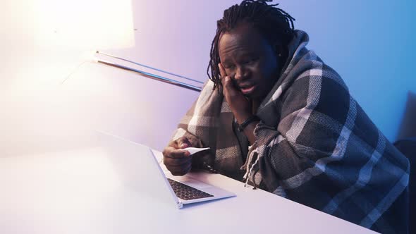 Sick Black Man with High Fever Having Online Consultation with Doctor alt