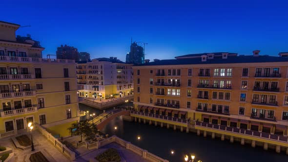 Canal Aerial Top View in Venicelike Qanat Quartier of the Pearl Precinct of Doha Day To Night alt