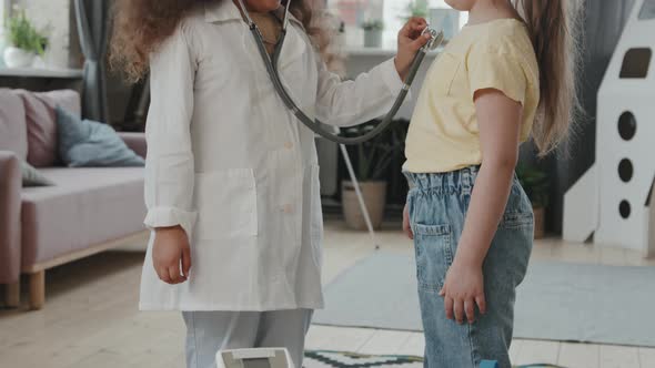 Adorable Little Girls Playing Doctor and Posing, Stock Footage | VideoHive 