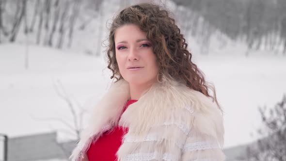 Portrait of Young Woman in Winter Park alt