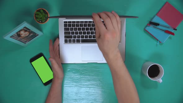 Male Working on Computer Top View alt
