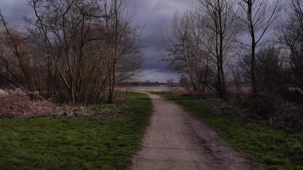 Meadows Between Narrow Road Near Oude Maas River In Puttershoek, Netherlands. - Dolly Shot alt