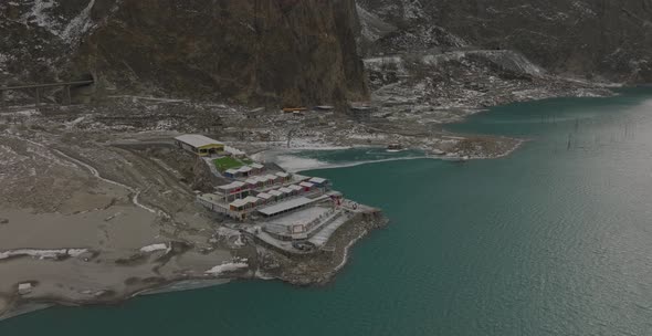 Tranquil Lake Surrounded By Rocky Slopes Mountains At Attabad Lake, Gojal Valley, Hunza, Gilgit-Balt alt