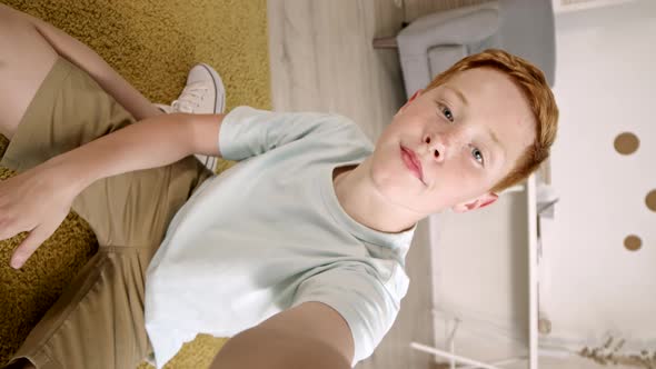 Red-haired Teenager Shooting Himself on Video alt