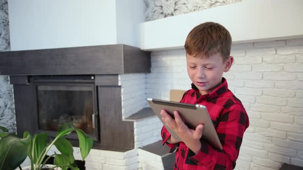 Schoolboy Using Tablet alt