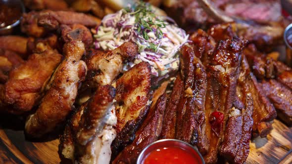 Meat grill set for beer party served on table in bar alt