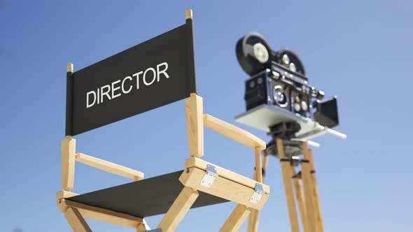 Old, retro, vintage film camera with director chair in the background. 4K HD alt