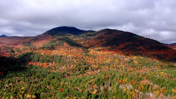 Aerial flythrough of Mountain Forests in Autumn with Fall Colors in New England