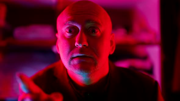 Strange Disappointed Bald Man is Watching Something Emotionally alt