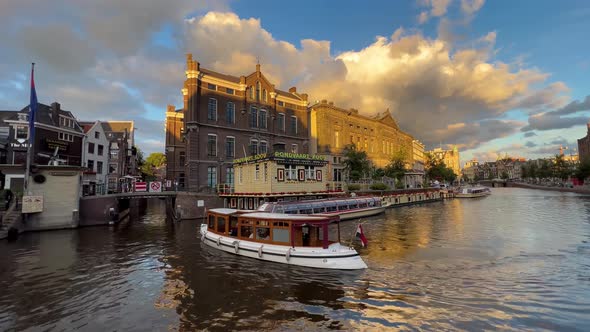 Pleasure Boat At Sunset In Amsterdam